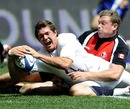 England Saxons fullback Alex Goode stretches to score a try