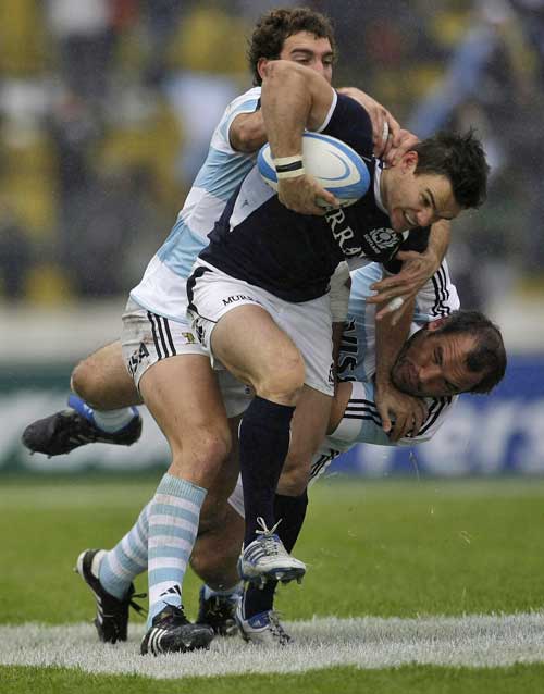 Scotland's Max Evans attracts the attention of the Argentina defence