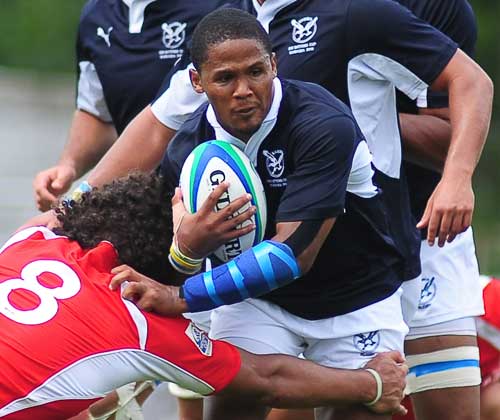 Namibia scrum-half Eugene Jantjies on the attack 