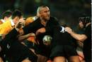 Jonah Lomu stands firm against the Australia defence