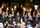 New Zealand captain Eric Rush lifts the 2003 IRB Sevens trophy