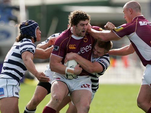 Jamie Mackintosh (C) of Southland is tackled during the Air New Zealand Cup match between Auckland and Southland