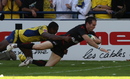 David Doherty of Sale dives over to score the first try