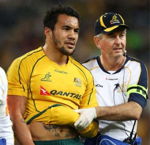 Australia wing Digby Ioane is helped from the field with a shoulder injury, Australia v England, ANZ Stadium, Sydney, June 19, 2010