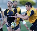 Australia fly-half Quade Cooper forces an offload