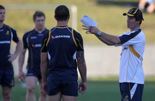 Australia coach Robbie Deans passes on instructions