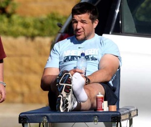 Injured England flanker Hendre Fourie watches training at Hale School, Perth, Australia, June 10, 2010 