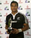 New Zealand's Julian Savea poses with the IRB Junior Player of the Year award