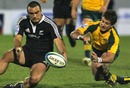 New Zealand's Charlie Ngal and Australia's Ian Prior vie for the ball