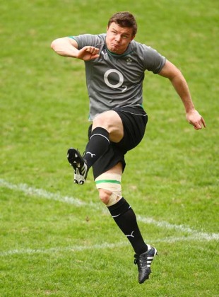 Ireland centre Brian O'Driscoll puts his foot through the ball during the Captain's Run, Suncorp Stadium, Brisbane, June 25, 2010