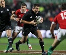 New Zealand's Richard Kahui spots a gap in the Wales defence