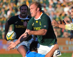 South Africa's Schalk Burger off loads the ball in the tackle, South Africa v Italy, Buffalo City Stadium, East London, South Africa, June 26, 2010