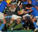 South Africa's Pierre Spies spots a gap in the Italy defence