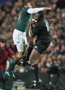 South Africa's Bryan Habana and New Zealand Sitiveni Sivivatu compete for a high ball