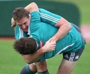 The All Blacks' Kieran Read gets to grips with skipper Richie McCaw