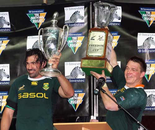 South Africa's Victor Matfield and John Smit celebrate winning the Tri-Nations