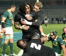 New Zealand centre Ma'a Nonu is congratulated after scoring