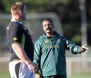 South Africa coach Peter De Villiers speaks with captain, John Smit