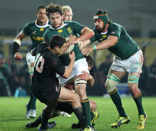 South Africa's Danie Rossouw carries the ball into contact