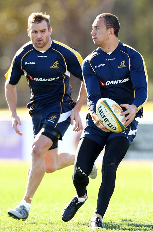 Australia's Quade Cooper and Matt Giteau pictured in training