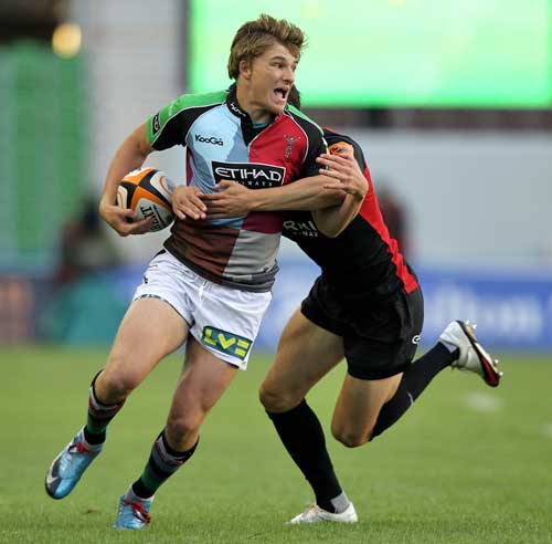 Quins' JJ Kilmartin is tackled by Saracens' Jamie Hearn