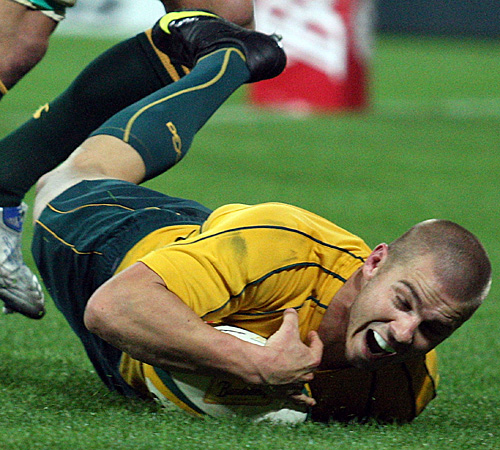 Australia wing Drew Mitchell scores in the dying moments of the first half