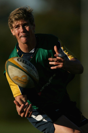 Berrick Barnes spins out a pass during training, Wallabies training, Harlequins Rugby Club, Melbourne, Australia, July 26, 2010