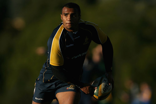 Will Genia spins out a pass during training