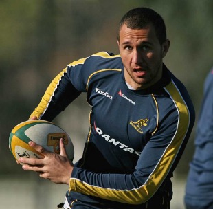 Australia's Quade Cooper eyes an opening, Wallabies training session, Xavier College, Melbourne, Australia, July 27, 2010