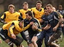 Wallabies utility Adam Ashley-Cooper takes on a tackle during training