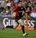 Saracens' Kevin Barrett races away to score a try
