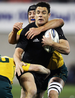 Daniel Carter of the All Blacks is tackled by the Australian defence, New Zealand v Australia, Tri-Nations, AMI Stadium, Christchurch, New Zealand, August 7, 2010