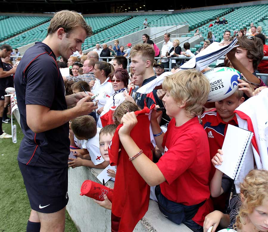 England flanker Tom Croft signs autographs for fans