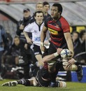 Nasi Manu looks to offload out of James King's tackle