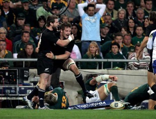 All Blacks skipper Richie McCaw is congratulated after scoring, South Africa v New Zealand, Tri-Nations, FNB Stadium, Soweto, South Africa, August 21, 2010