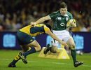 Ireland's Brian O'Driscoll is tackled by Australia's Cameron Shepherd
