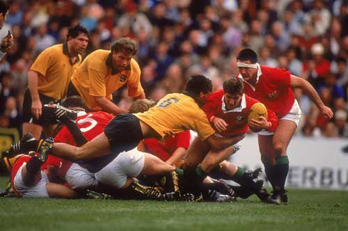Robert Jones attempts to break a tackle