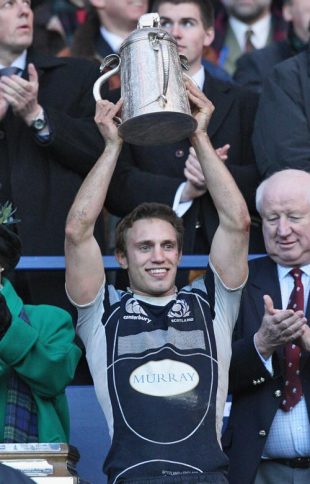 Scotland captain, Mike Blair lifts the Calcutta cup following his teams 15-9 victoryduring the RBS Six Nations Championship match between Scotland and England at Murrayfield in Edinburgh, Scotland on March 8, 2008.