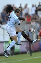 Racing wing Mirco Bergamasco competes with Toulon's Paul Sackey for a high ball