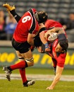 Canterbury Metro's Sonny Bill Williams is tackled hard