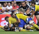 Elvis Vermeulen gets some help from his Clermont teammates to score
