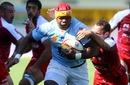 Perpignan lock Robins Tchale-Watchou stretches the Montpellier defence