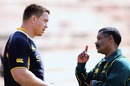 South Africa head coach Peter de Villiers talks with John Smit