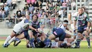 Stade Francais scrum-half Julien Dupuy feeds his backs