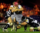 Newcastle's Tim Swinson is tackled by Sale's Andrew Sheridan