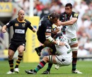 London Wasps lock Simon Shaw is tackled by Chris Robshaw