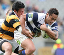 Taranaki's George Pisi tackles Auckland's Ben Atiga