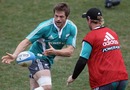 All Blacks skipper Richie McCaw gets an offload away during training