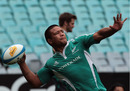 New Zealand hooker Keven Mealamu launches the ball 