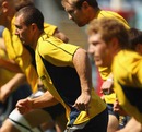 Quade Cooper leads the way during training